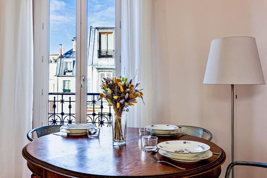 Charmant Appartement Au Coeur De Paris Exteriör bild