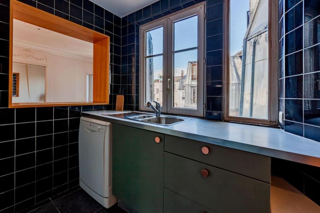 Charmant Appartement Au Coeur De Paris Exteriör bild