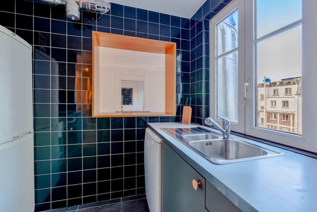 Charmant Appartement Au Coeur De Paris Exteriör bild
