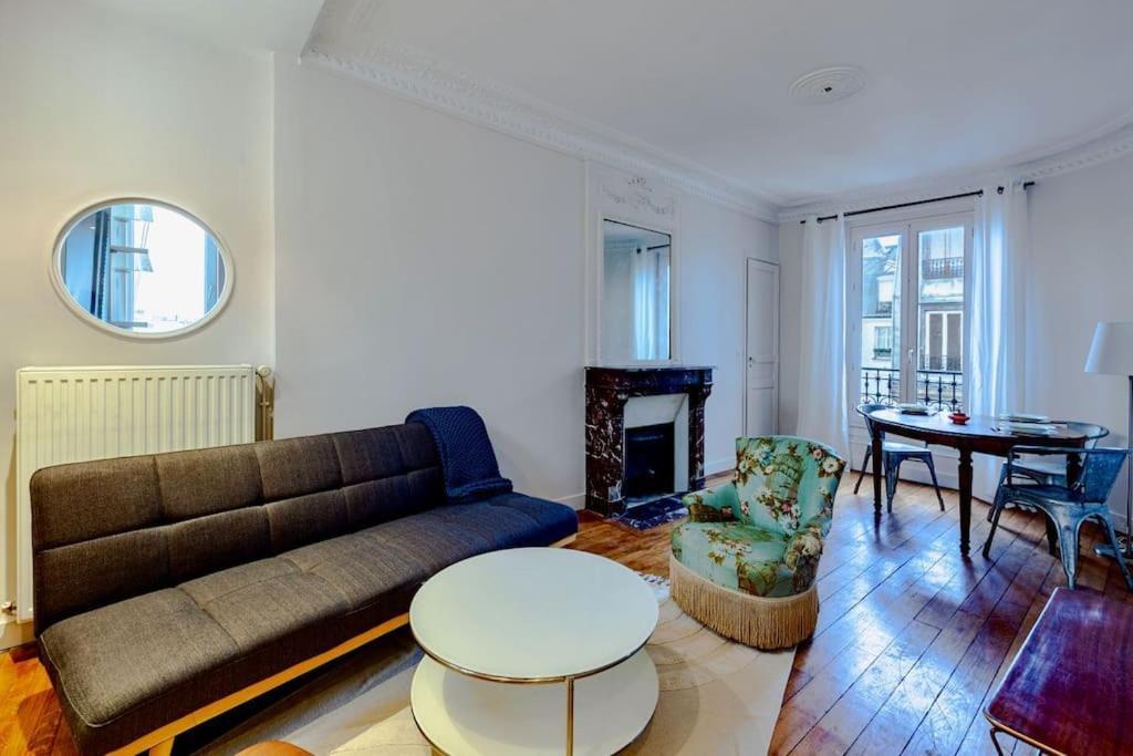 Charmant Appartement Au Coeur De Paris Exteriör bild